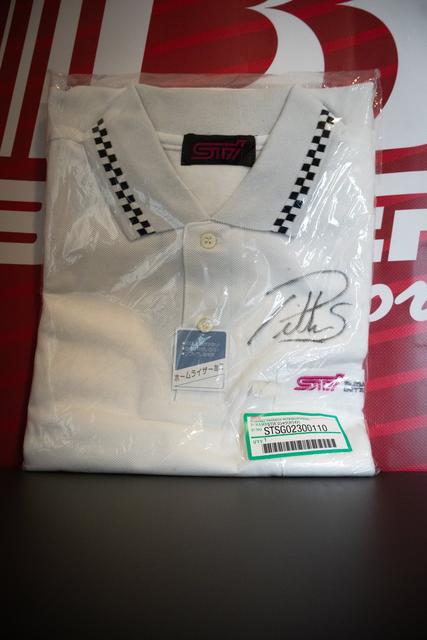 VINTAGE STI WHITE POLO AUTOGRAPHED BY PETTER SOLBERG