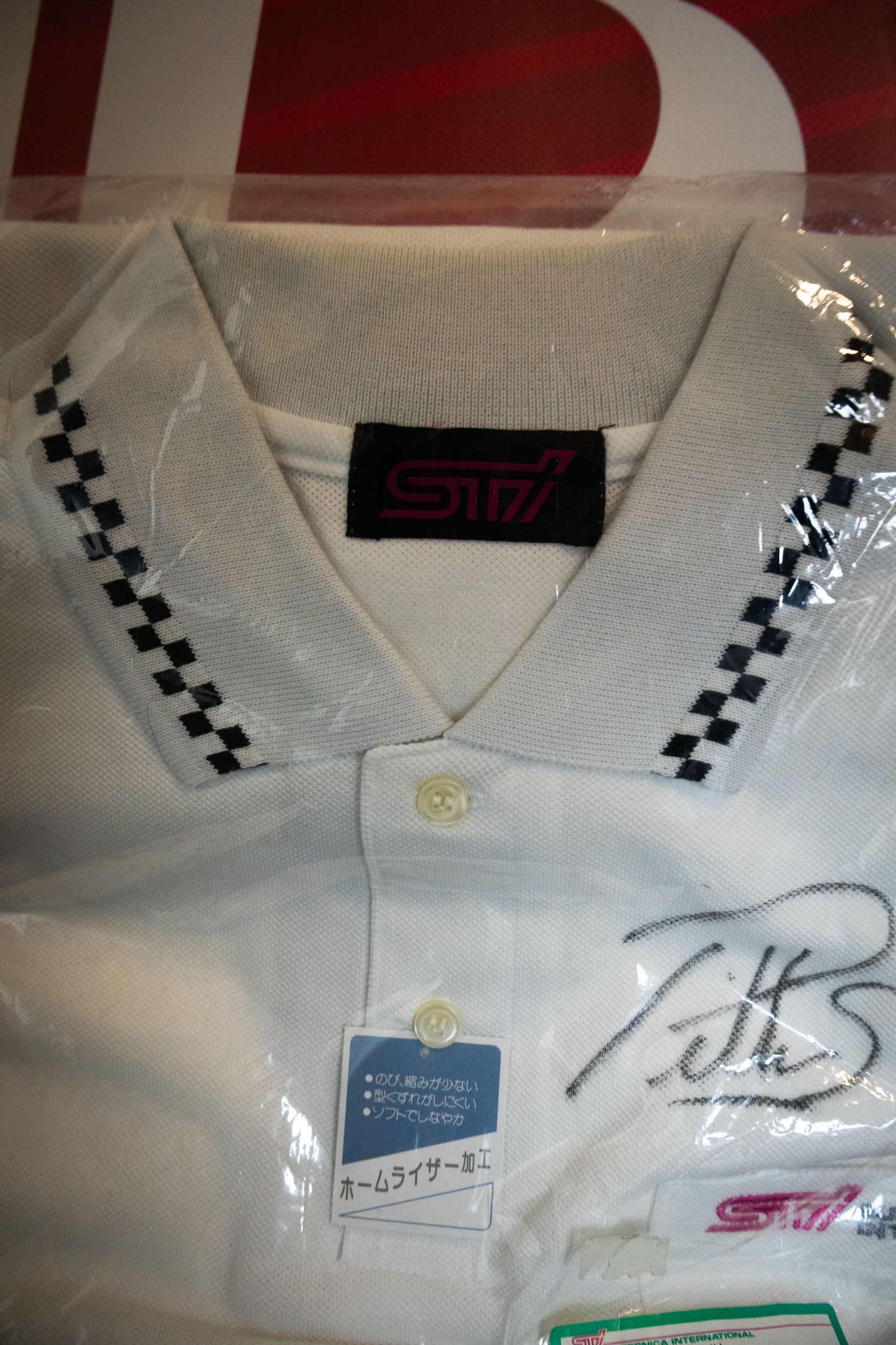 VINTAGE STI WHITE POLO AUTOGRAPHED BY PETTER SOLBERG