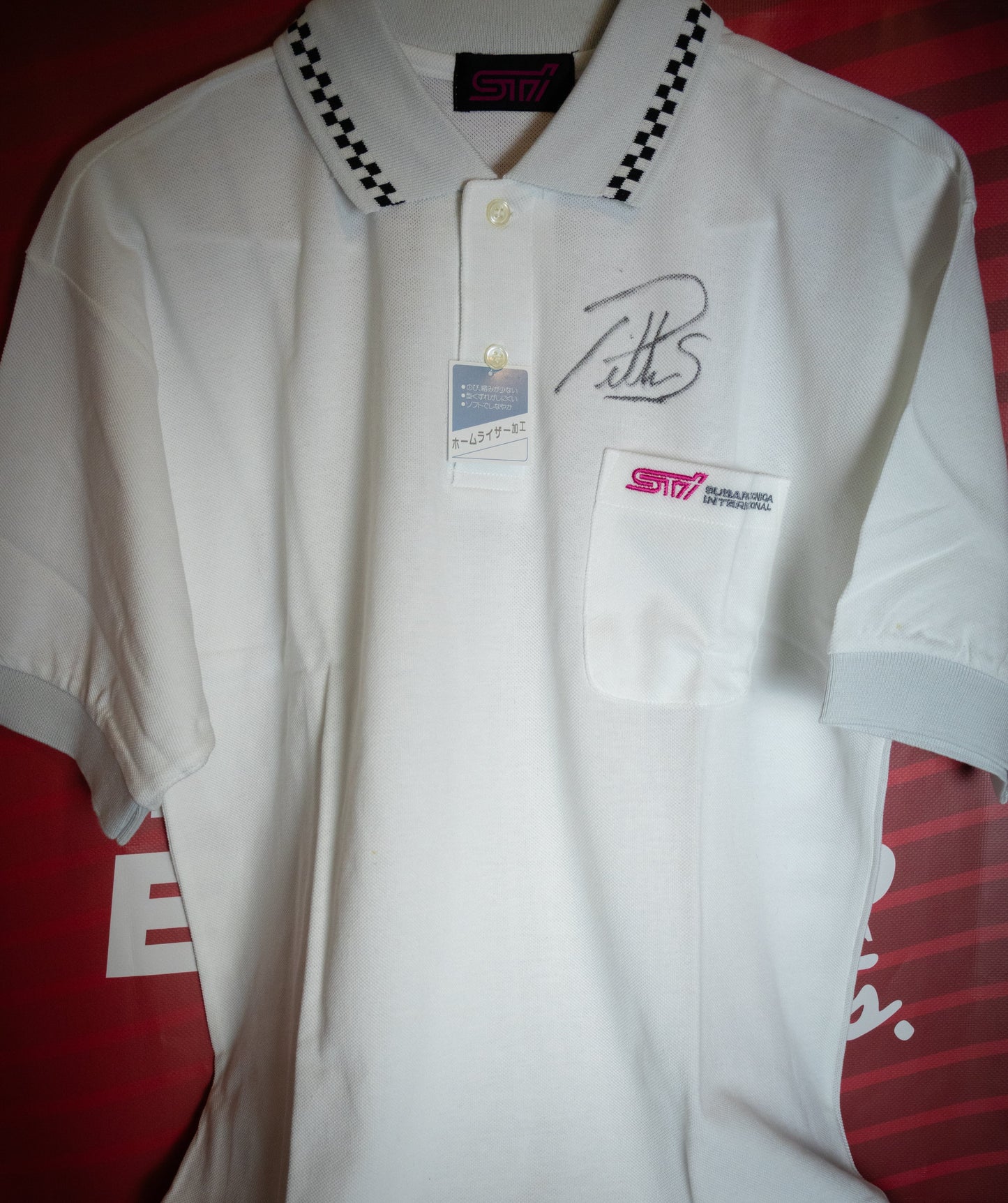 VINTAGE STI WHITE POLO AUTOGRAPHED BY PETTER SOLBERG