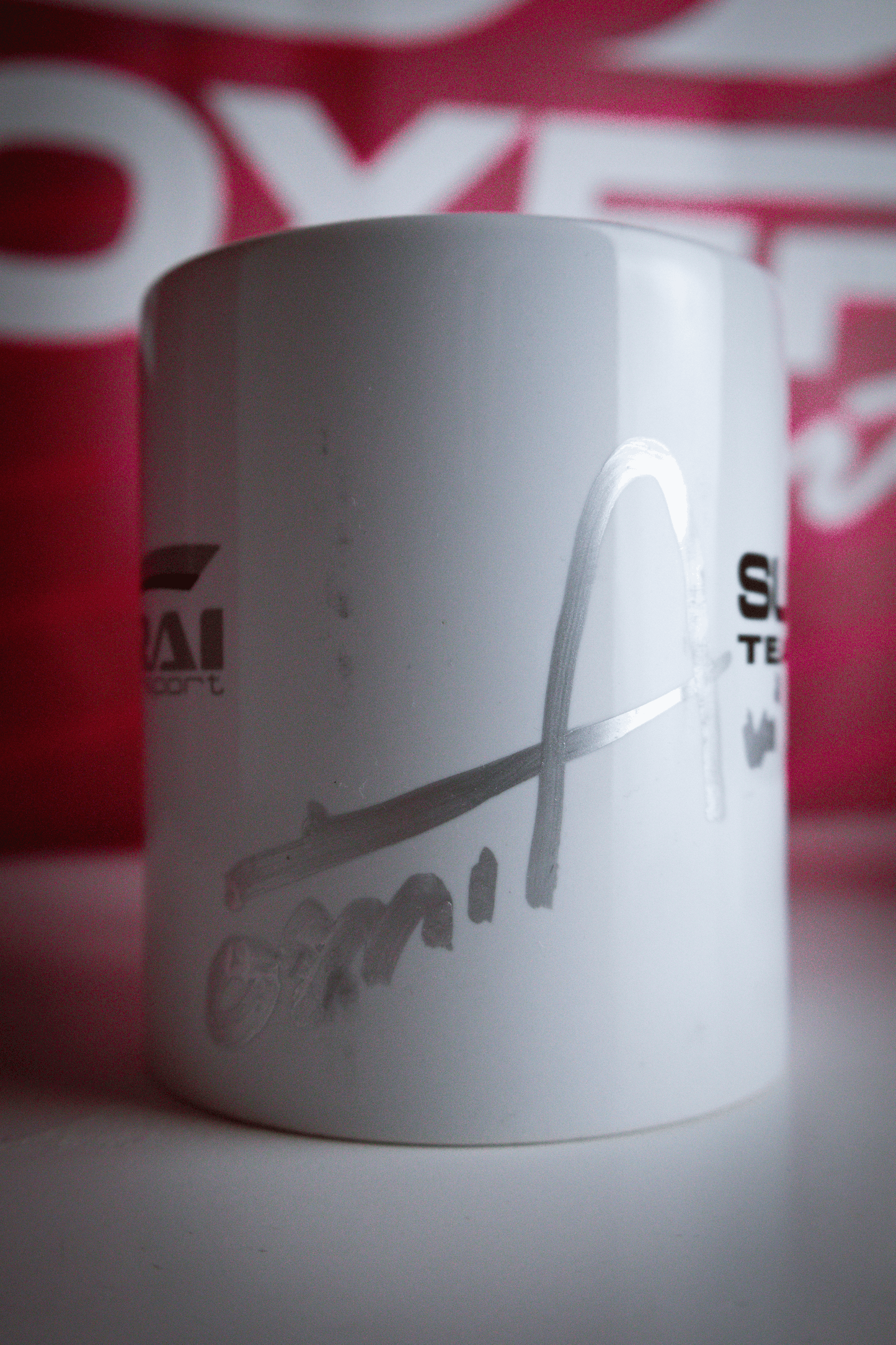 GENUINE ARAI MOTORSPORTS MUG SIGNED BY TOSHI ARAI