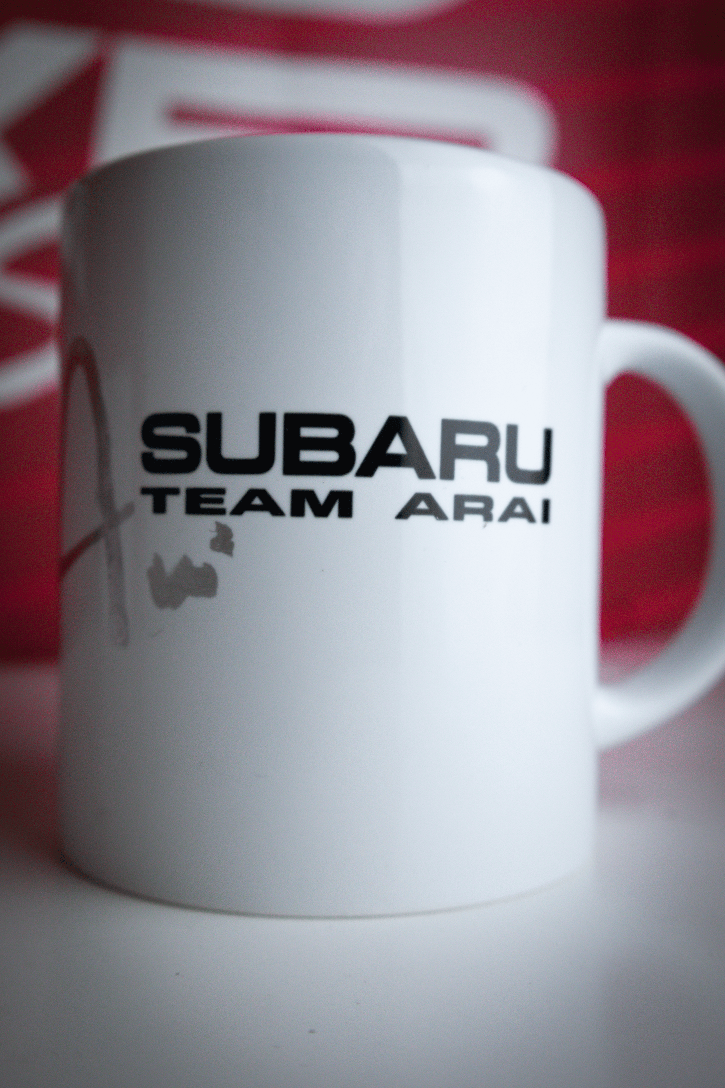 GENUINE ARAI MOTORSPORTS MUG SIGNED BY TOSHI ARAI