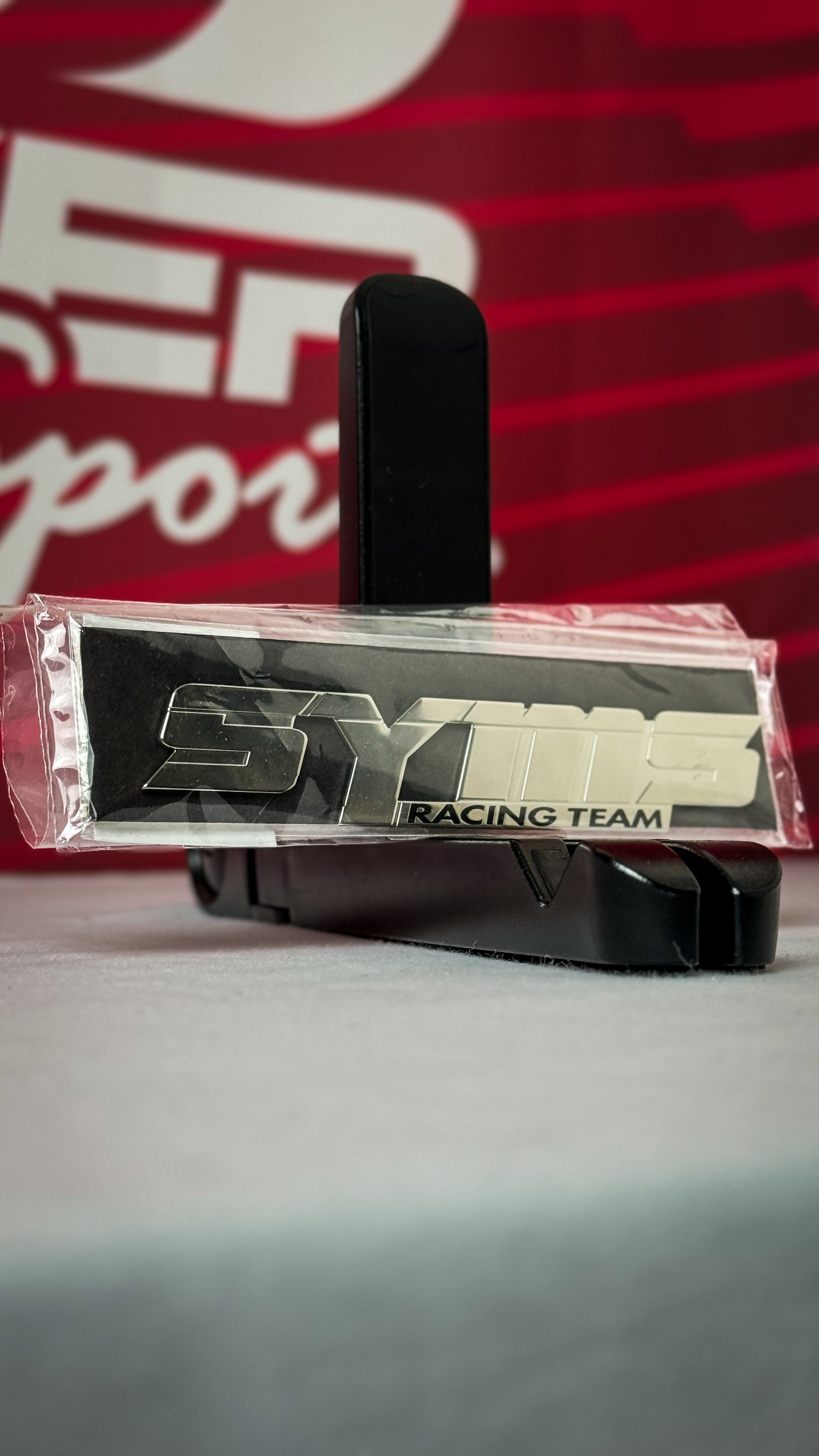 SYMS Racing Team metal badge emblem