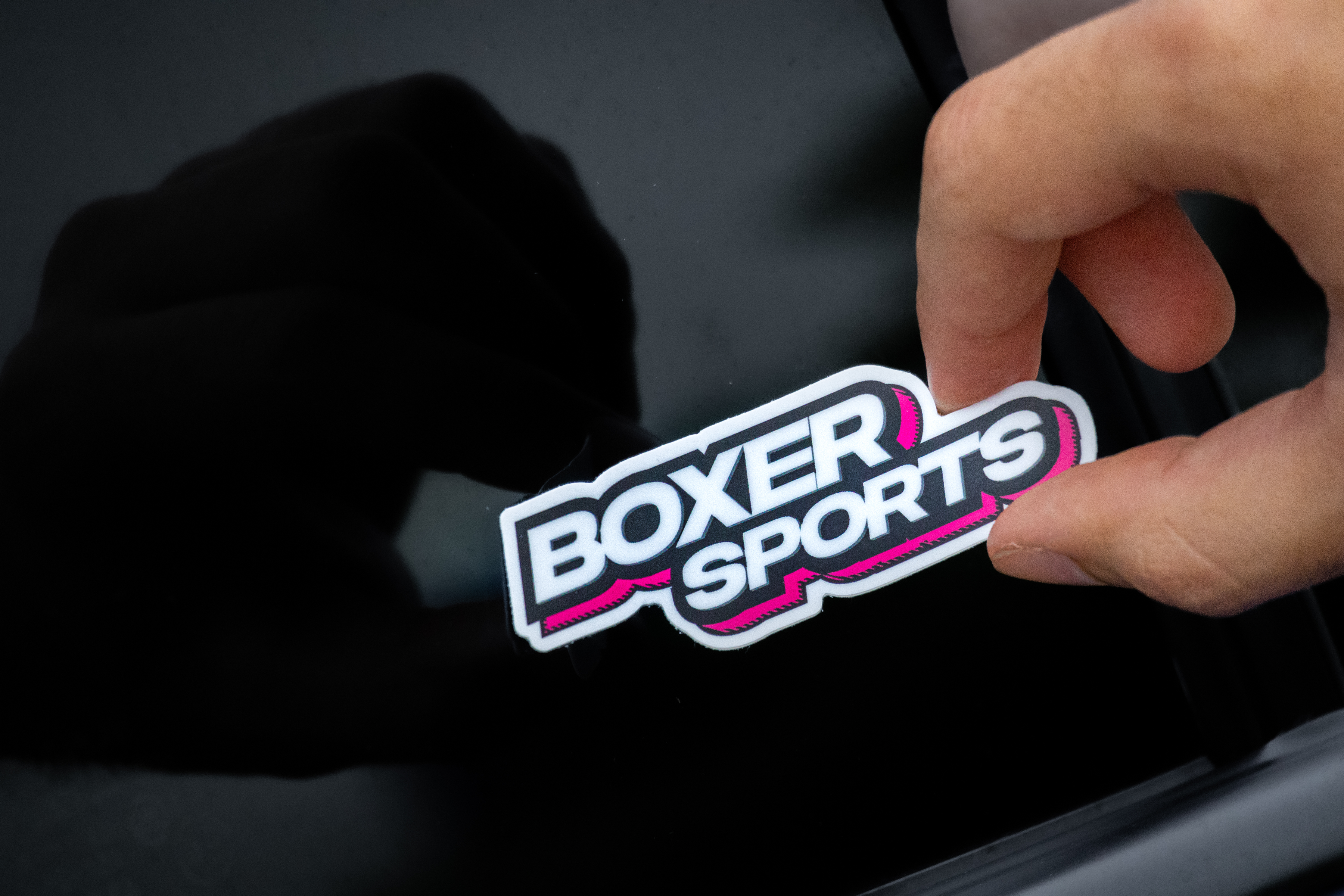 BoxerSports Sticker being applied to window